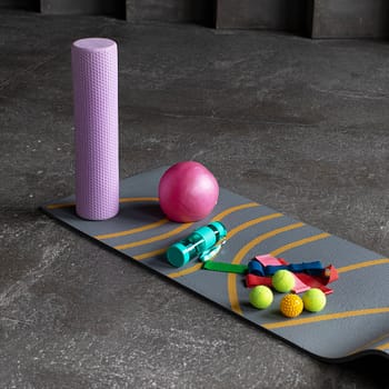 Roller, balls and balls for myofascial release and self-massage. The concept of MFR, fitness and Pilates.